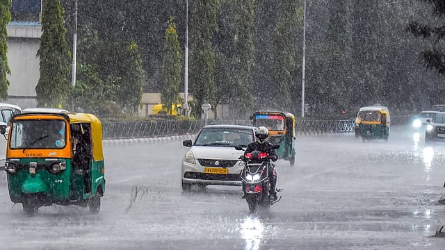 kannadaprabha_2026-03-18_9rzpqbie_bengaluru-rain-1-1-1.jpeg