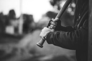 baseball-bat-hands-ready-to-attack-aggressive-hooligan-behind-80265336.jpg